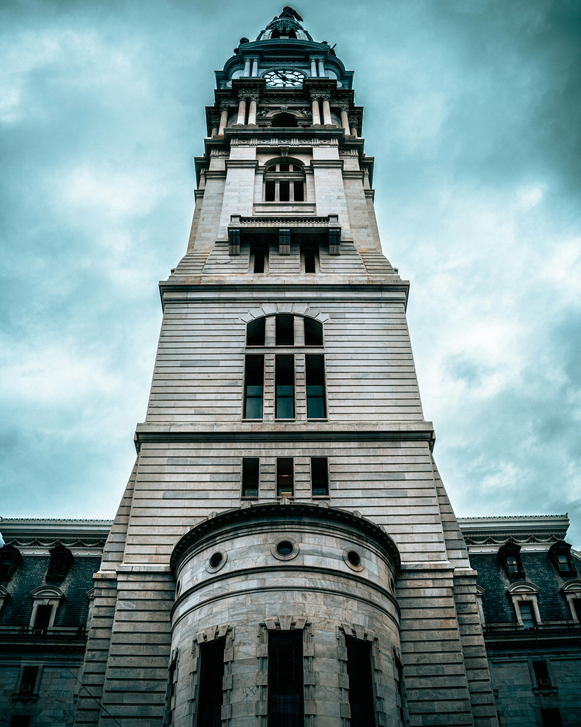 a tall building with a clock on the top of it
