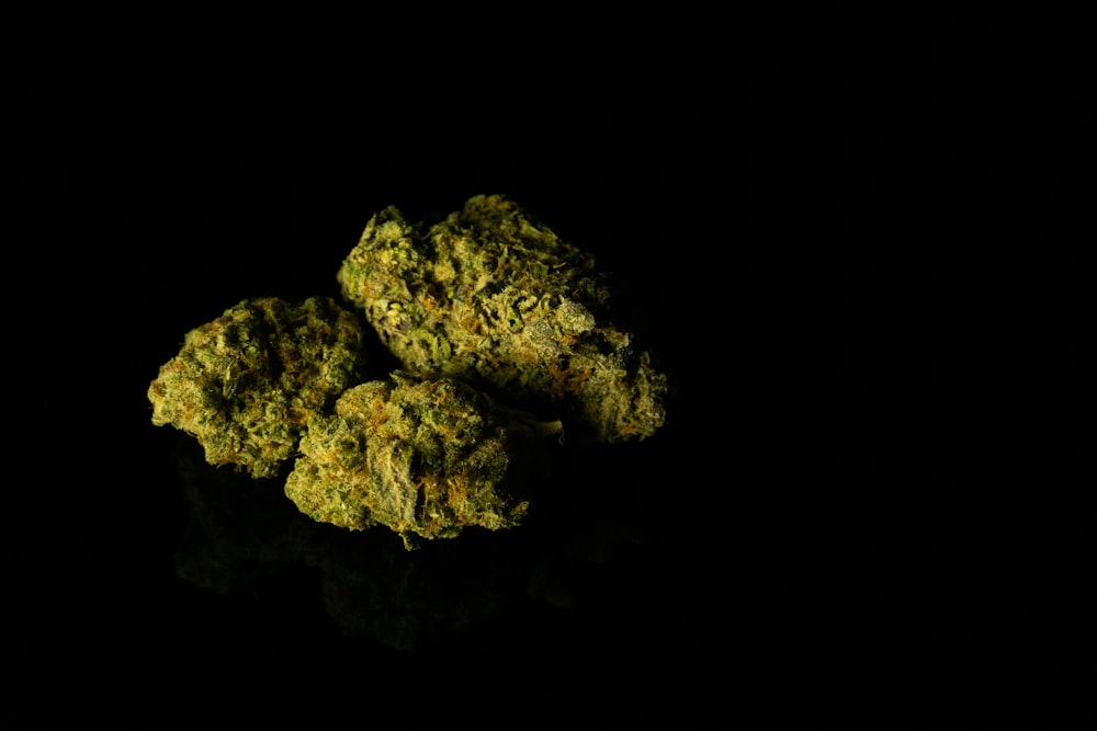 a pile of marijuana sitting on top of a table