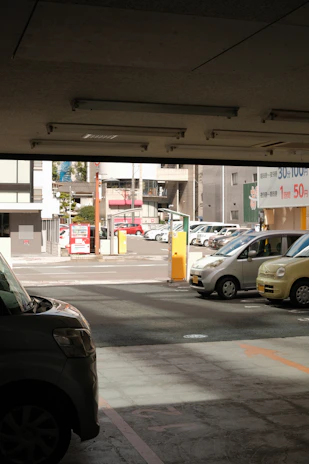 Parking lot with overhead cameras and AI-powered vehicle detection in action.