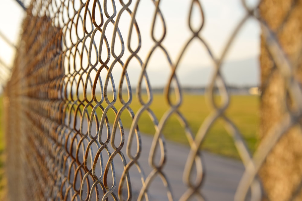 a close up of a chain link fence