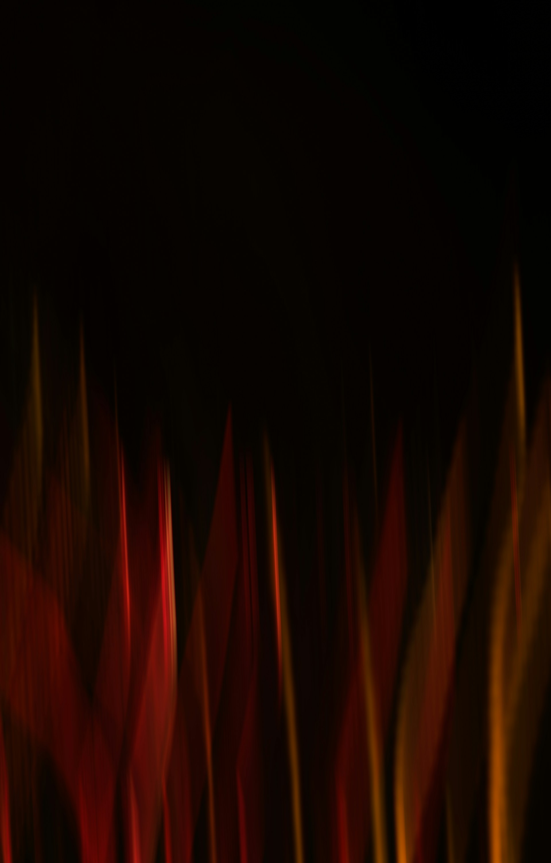 a blurry photo of red and yellow lines