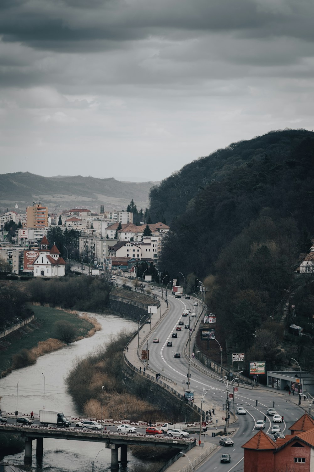 a view of a city with a bridge over a river