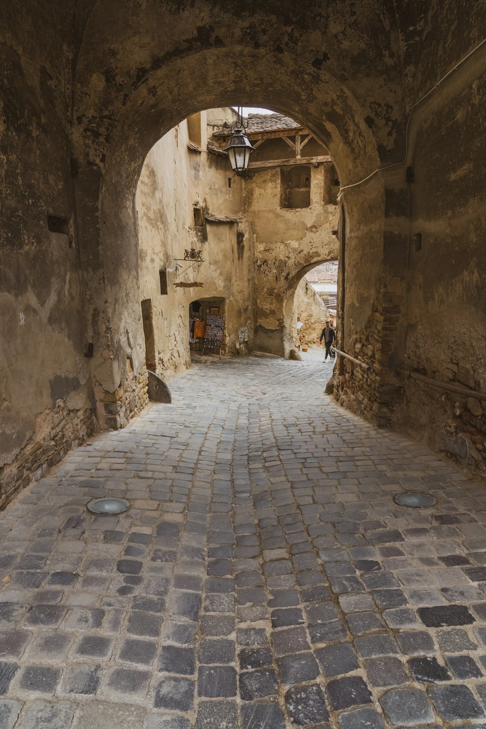 a cobblestone street in an old city