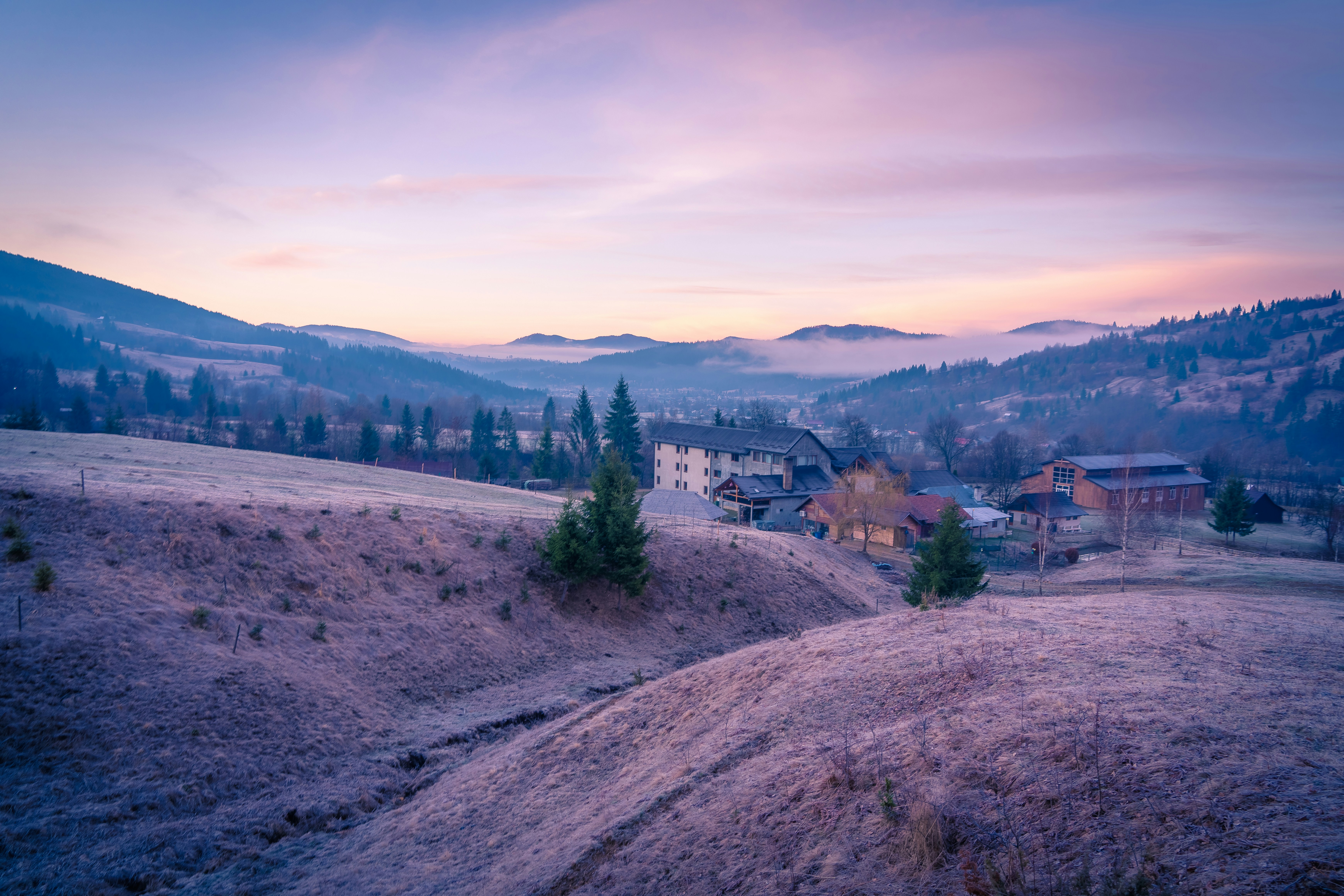 A scenic view of a town in the mountains photo – Free Romania Image on ...