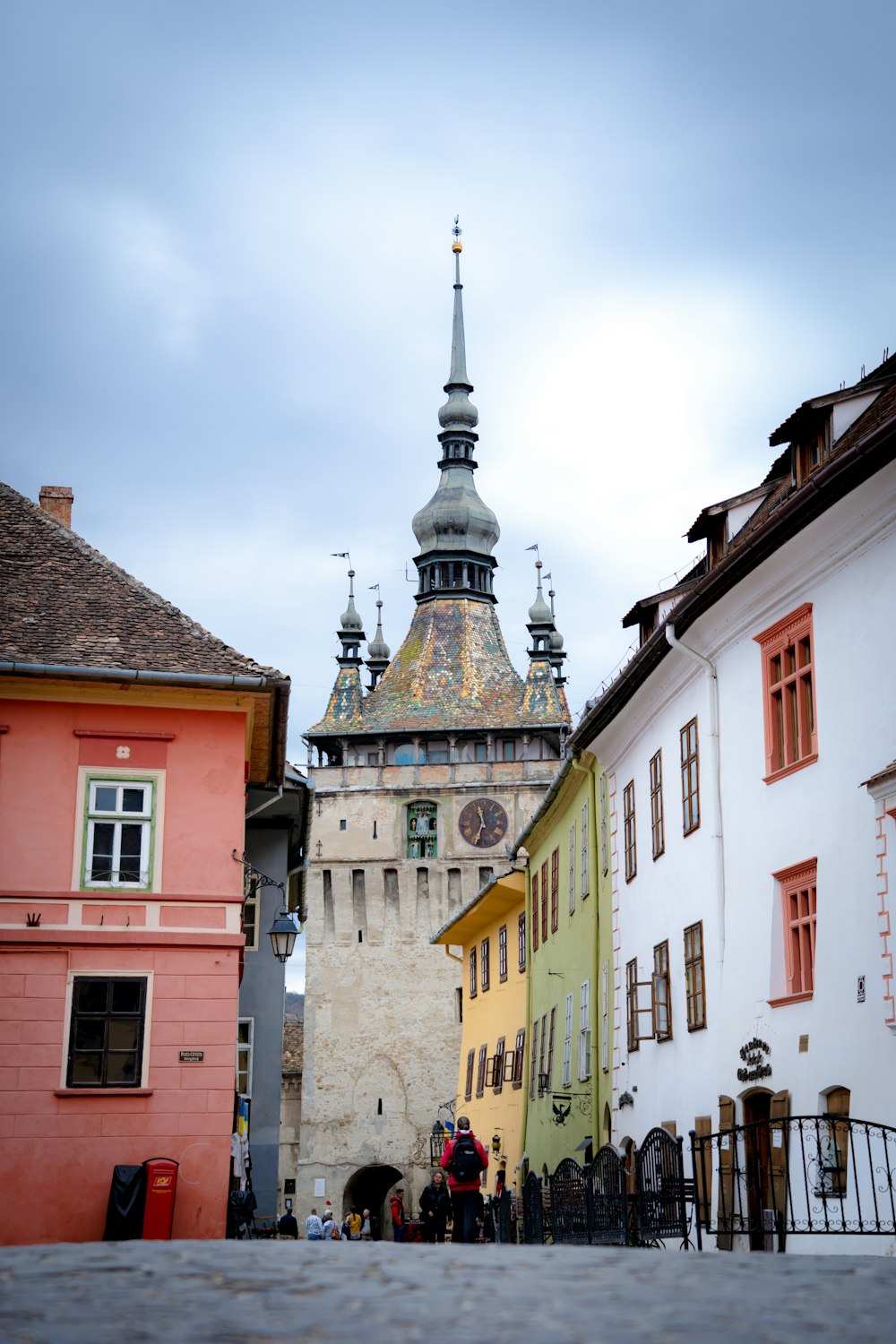 a tall building with a clock on the top of it