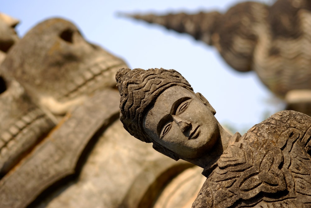 a close up of a statue of a woman