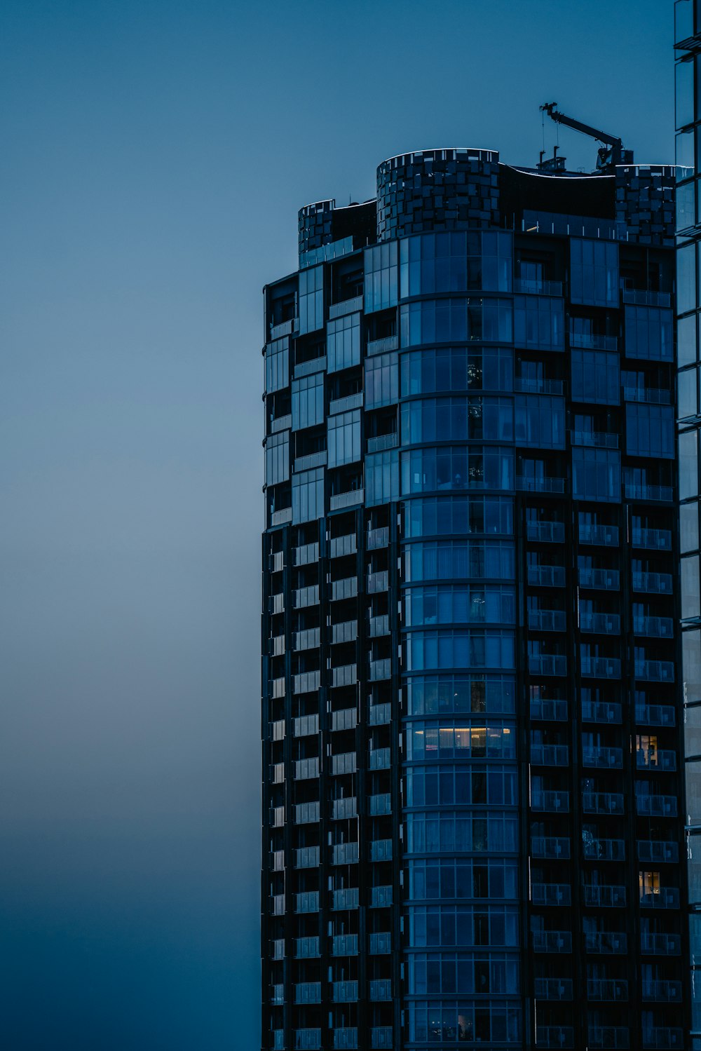 a very tall building with a sky in the background