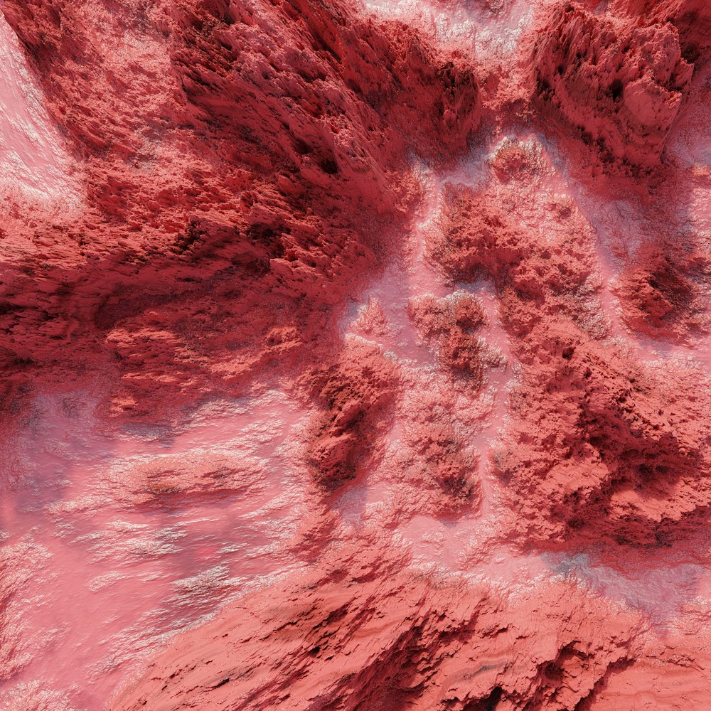 an aerial view of a red rock formation