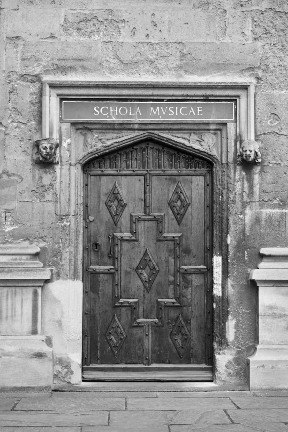 a black and white photo of a door