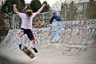 a skateboarder is doing a trick in the air