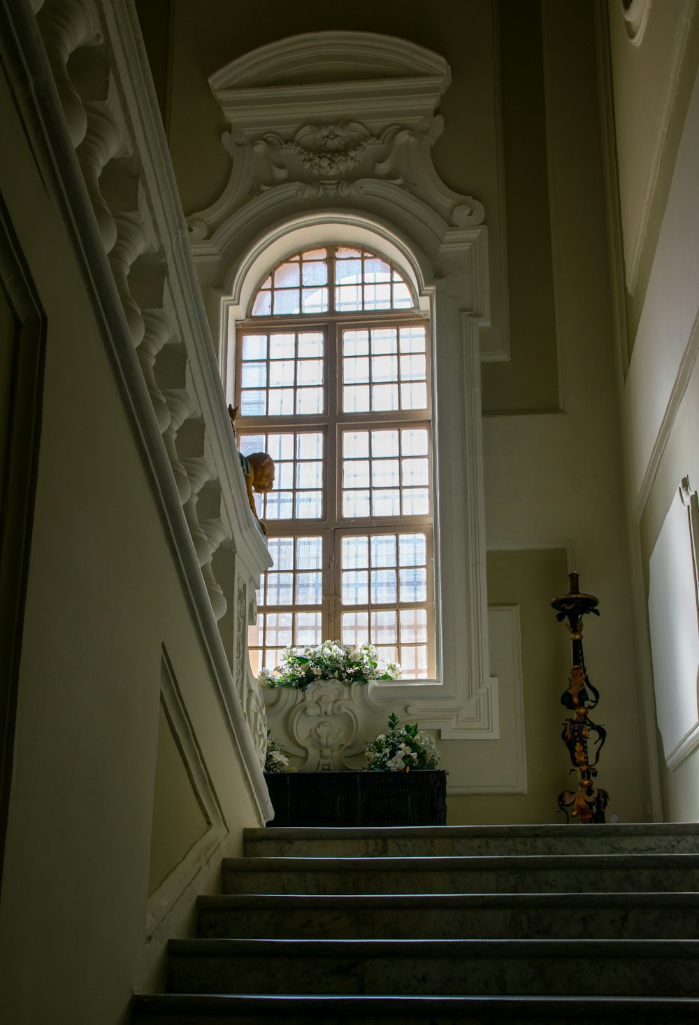 a set of stairs leading up to a window