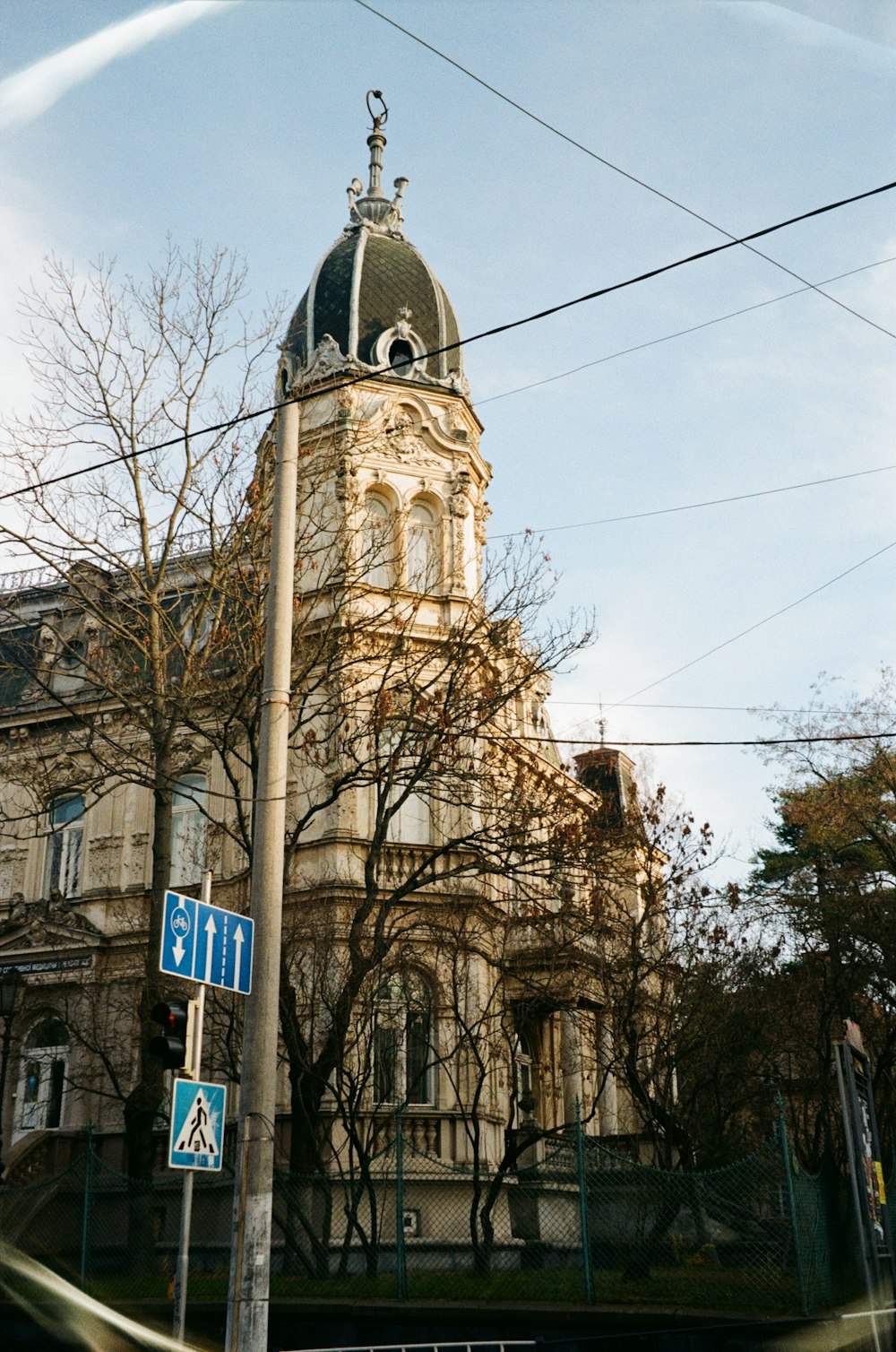 a tall building with a clock on the top of it