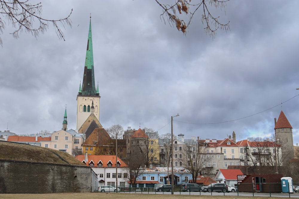 a church steeple towering over a small town