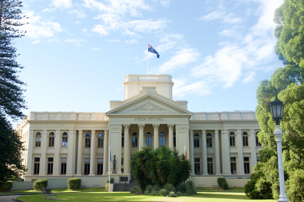 a large building with a flag on top of it