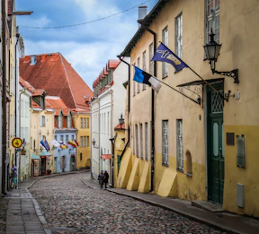 a cobblestone street in a european city