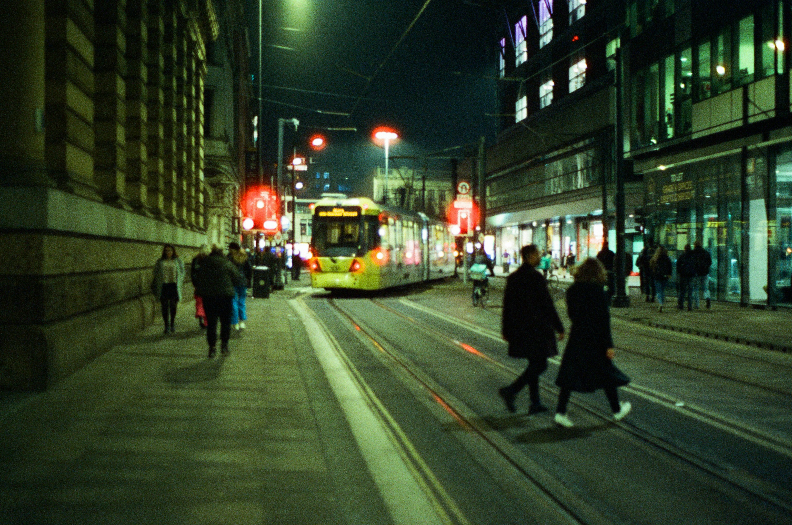 Street photograph taken in Manchester at night.