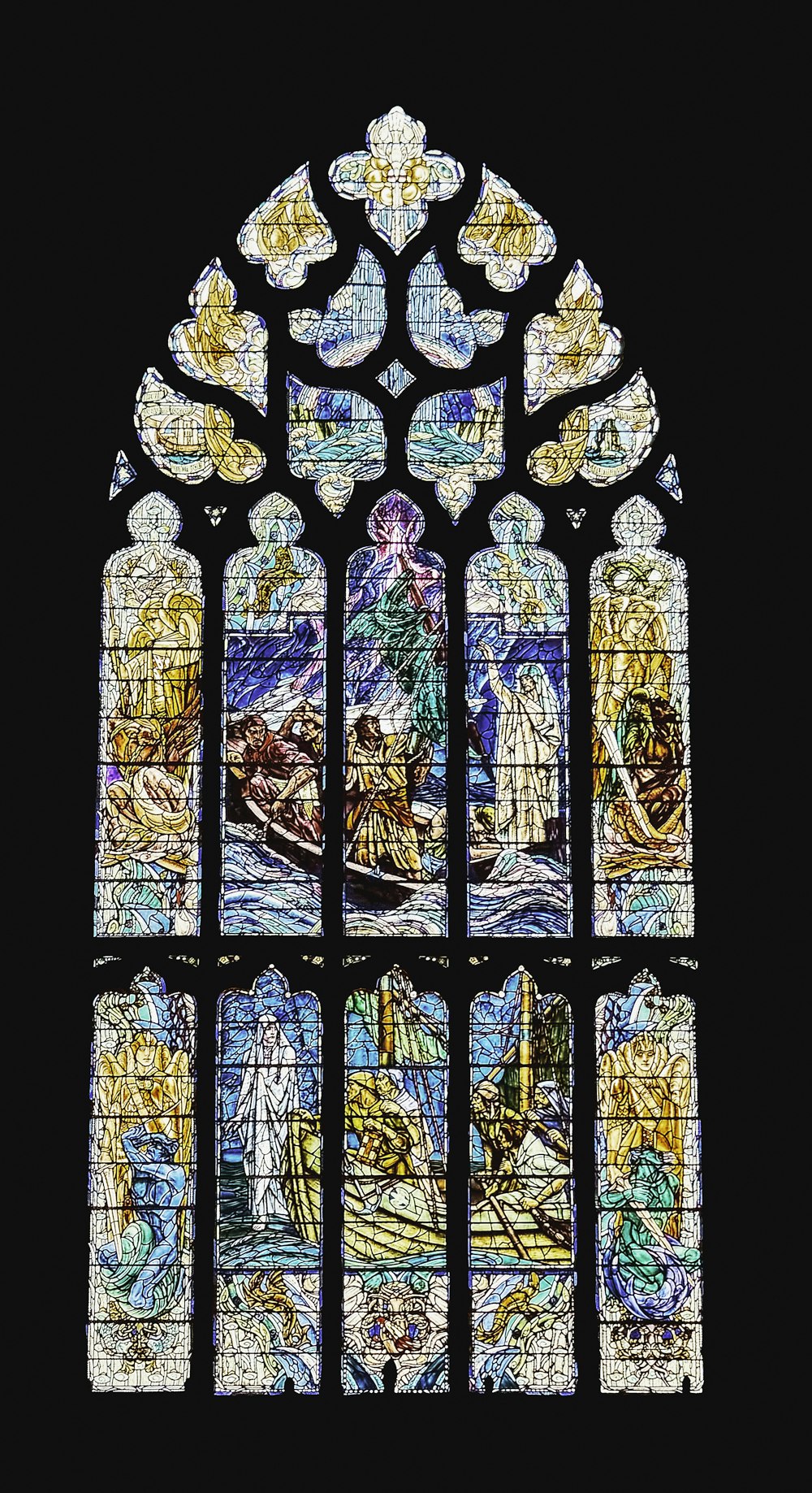 a large stained glass window in a church