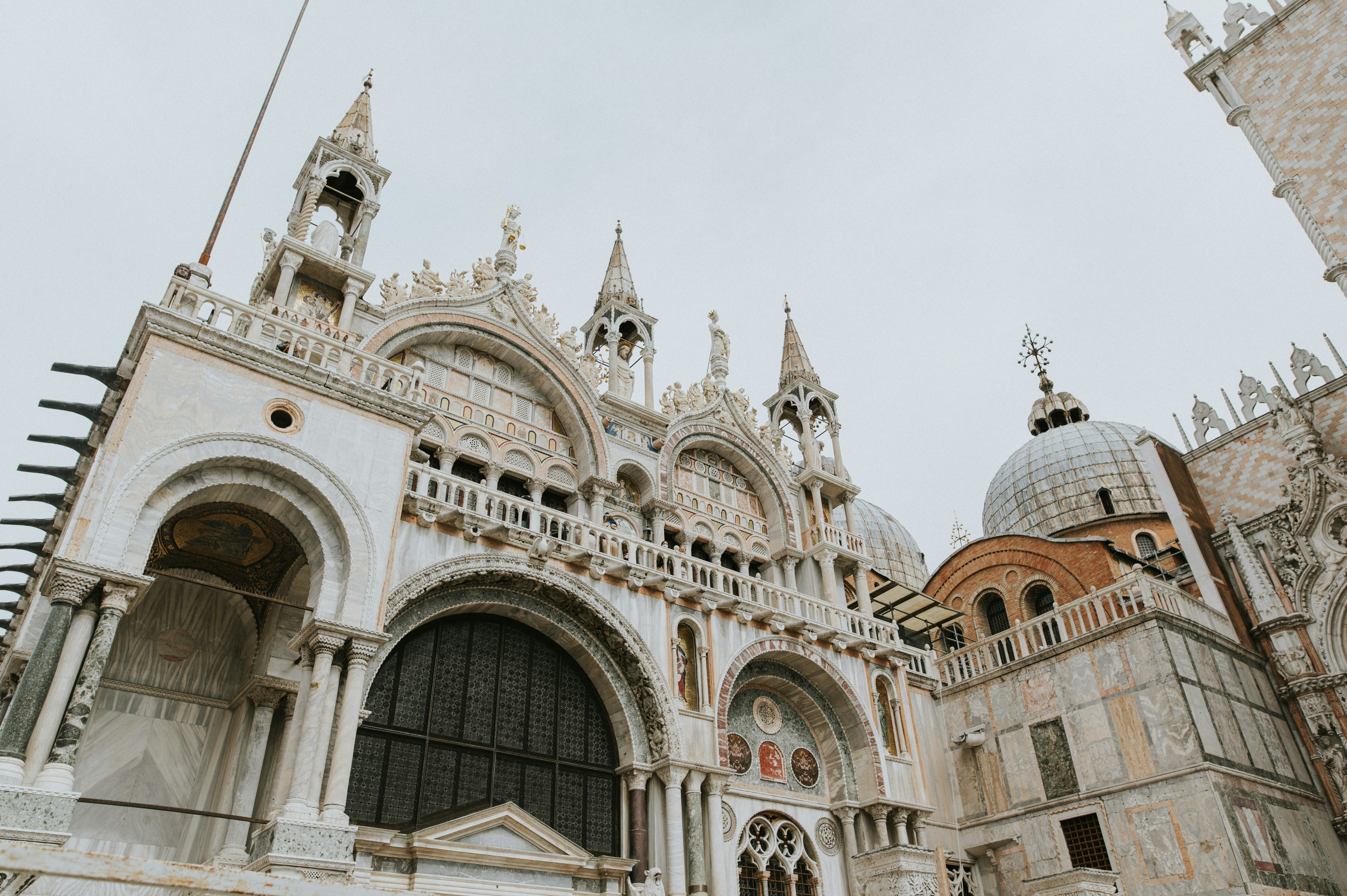 a large white building with a clock on it