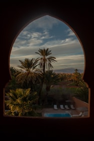 A scenic view of the hotel gardens and pool area.