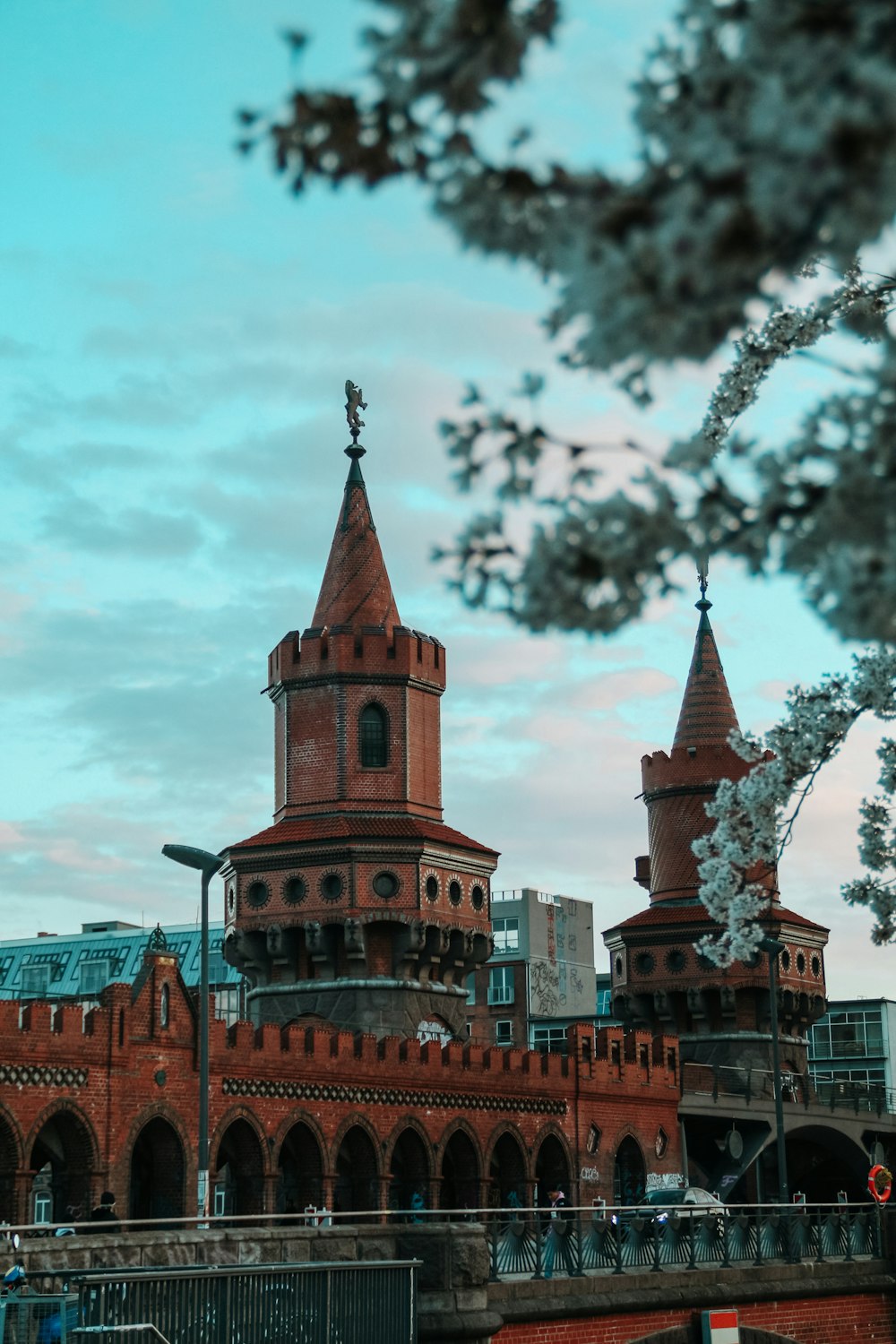 a large brick building with a clock tower