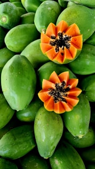 A beautifully arranged set of ripe papayas.