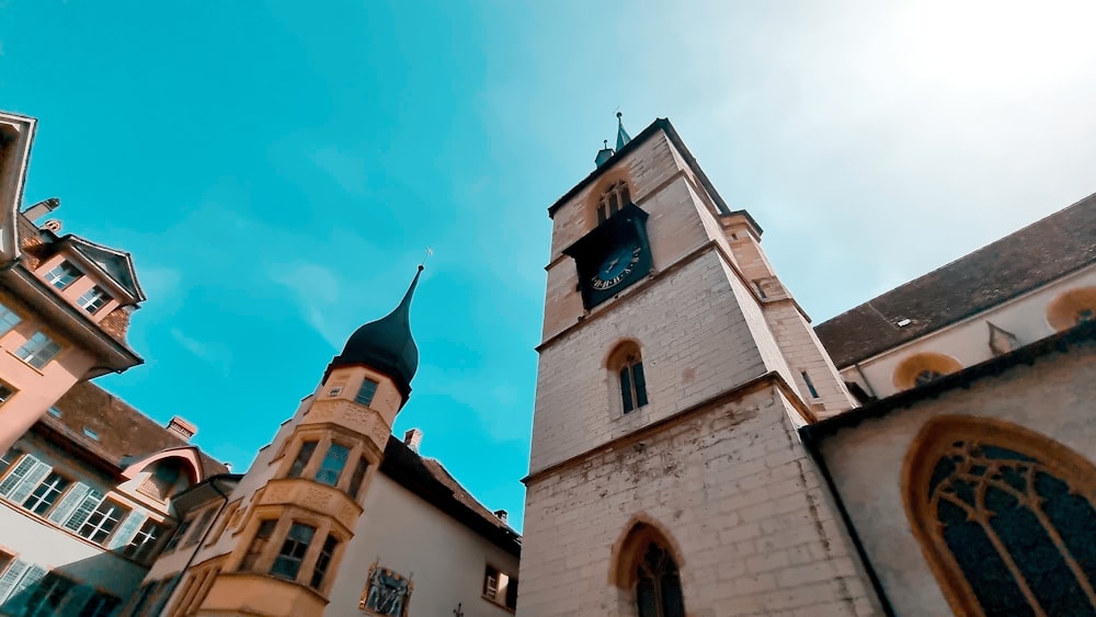 a church steeple with a clock on it