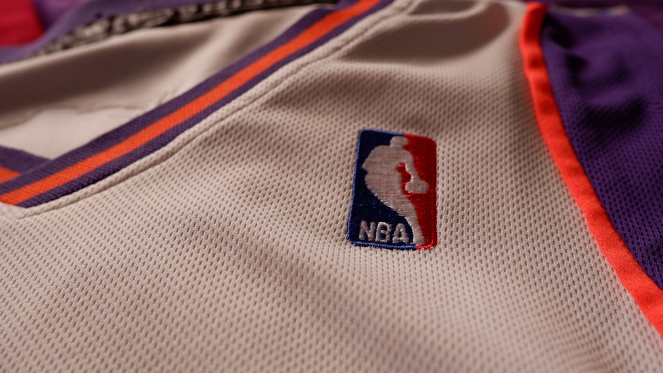A close-up of a customized football jersey with vibrant colors.