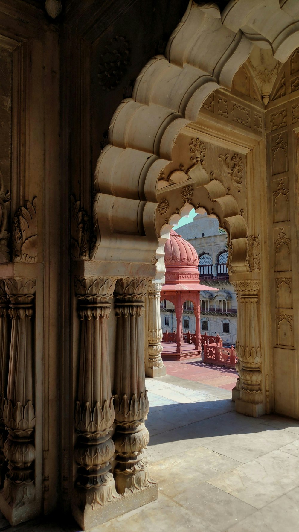 a view of a building through an archway