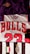 The image features a collection of sports jerseys, including a purple jersey with an emblem, a white jersey with red lettering spelling 'BULLS' and the number 23, and a black and white striped jersey with the Juventus emblem.