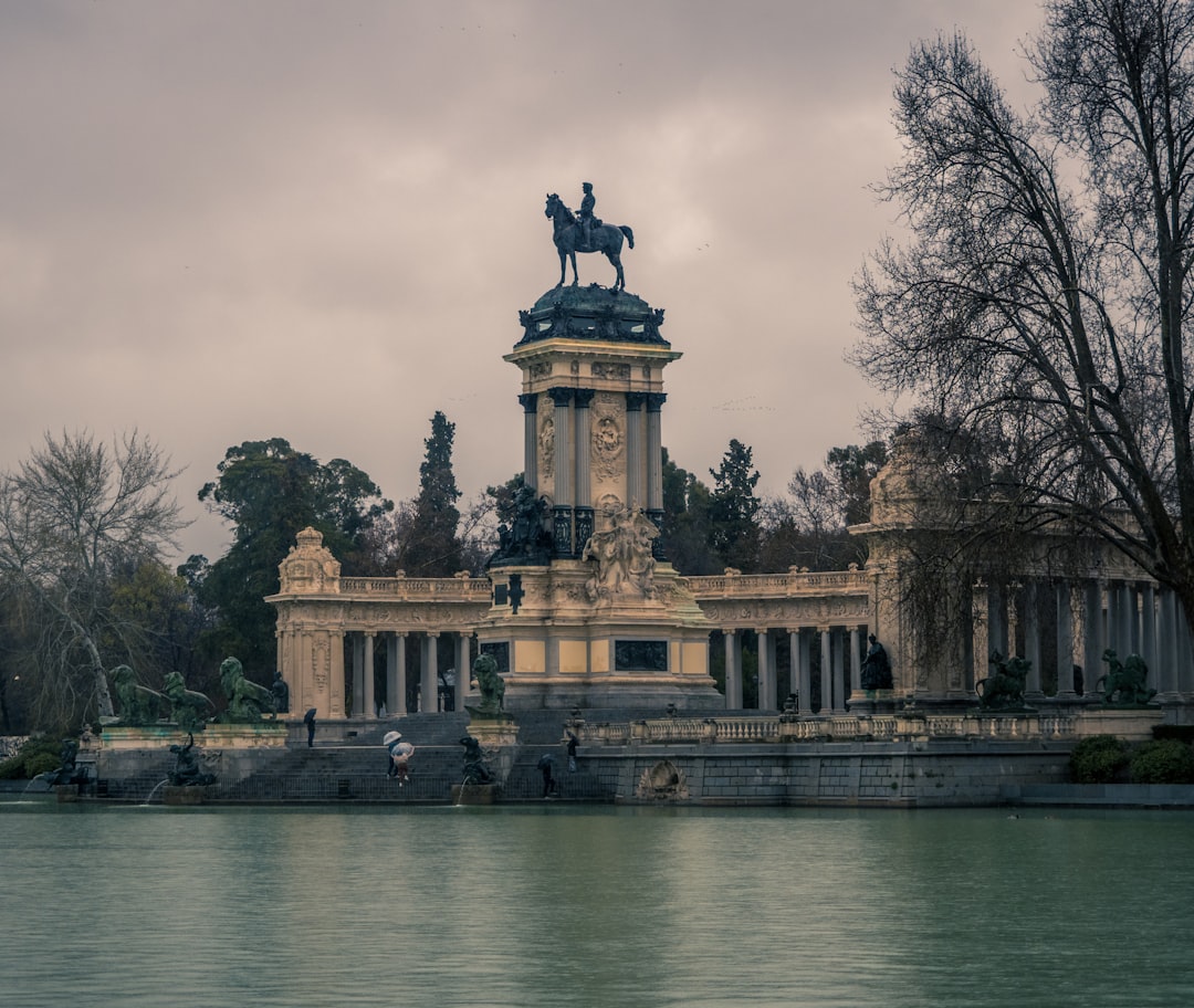a statue of a man on a horse on top of a building,
