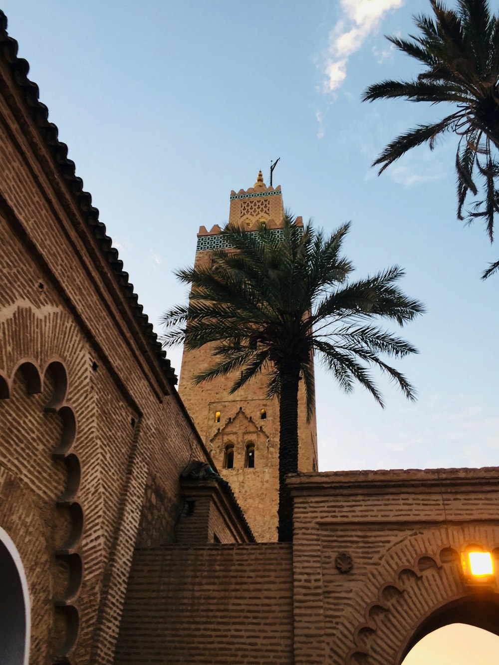 a tall tower with a clock on the top of it