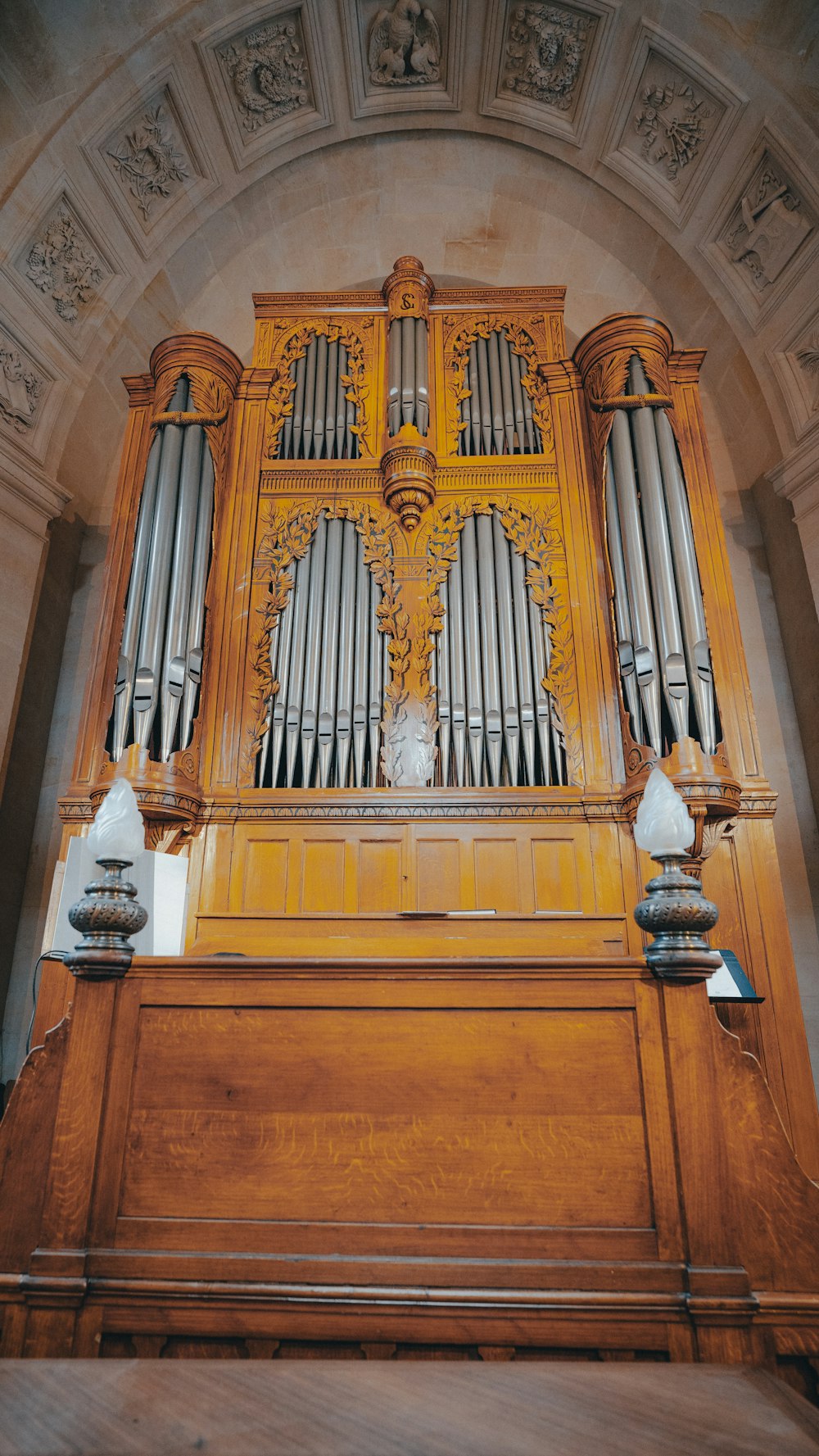 an old pipe organ in a building