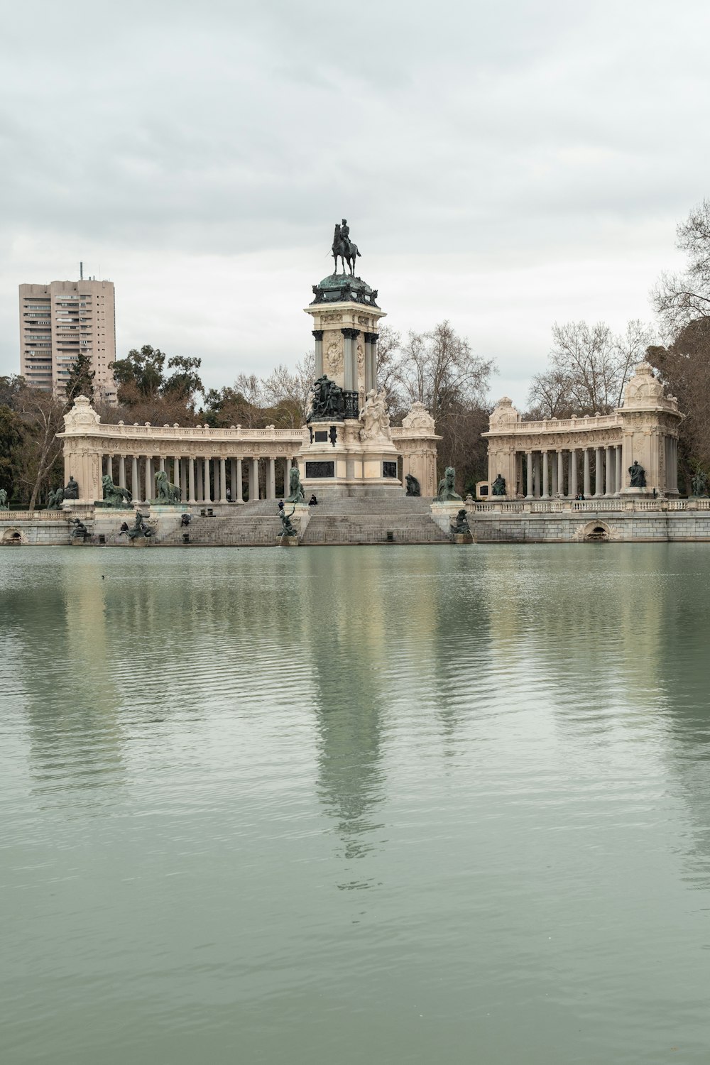 a large body of water in front of a building