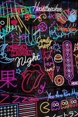 a display of neon signs in a store window