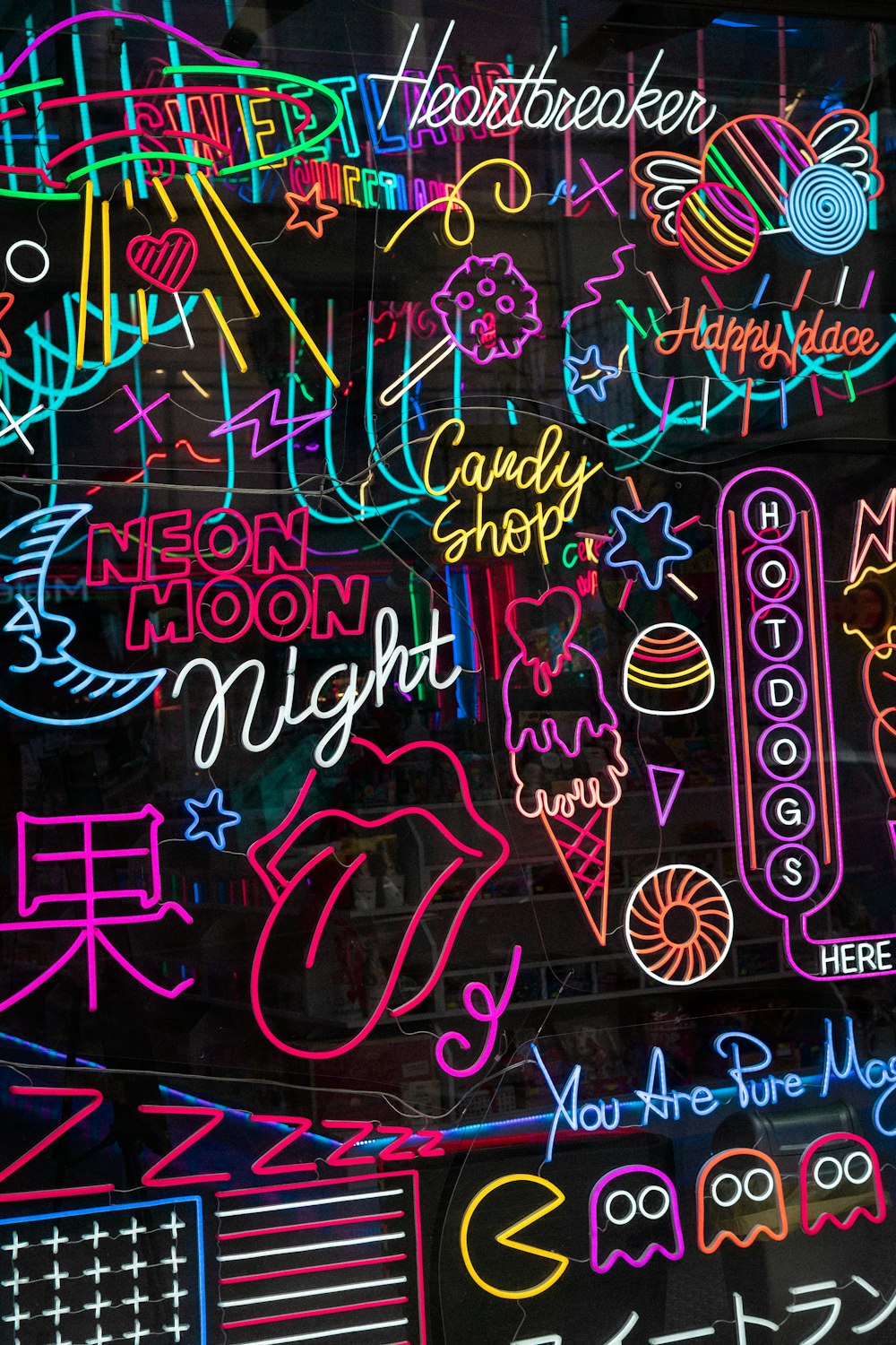 a display of neon signs in a store window