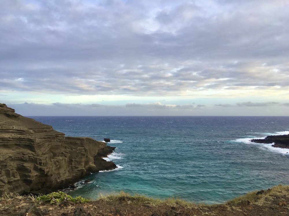 a view of the ocean from a cliff