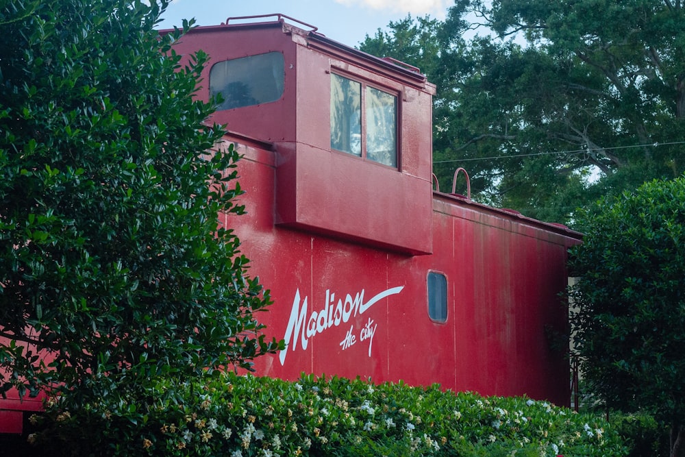 a red building with a sign on it