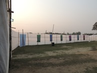 An outdoor event space decorated with custom banners and signage.