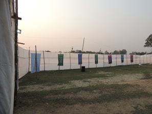 An outdoor event setup with banners and decorations.
