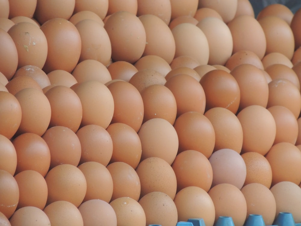 a bunch of eggs stacked on top of each other