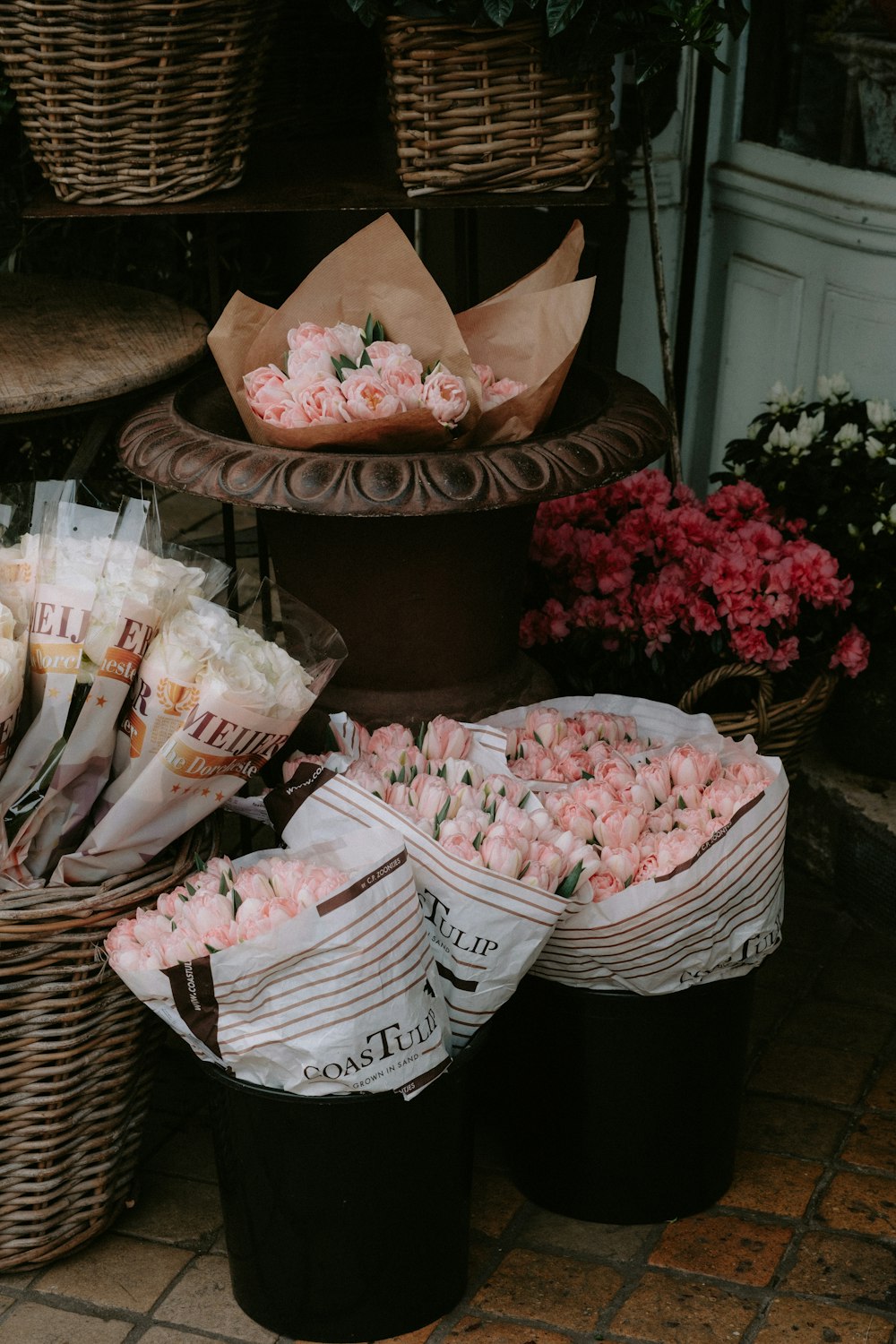 a bunch of flowers that are sitting on a table