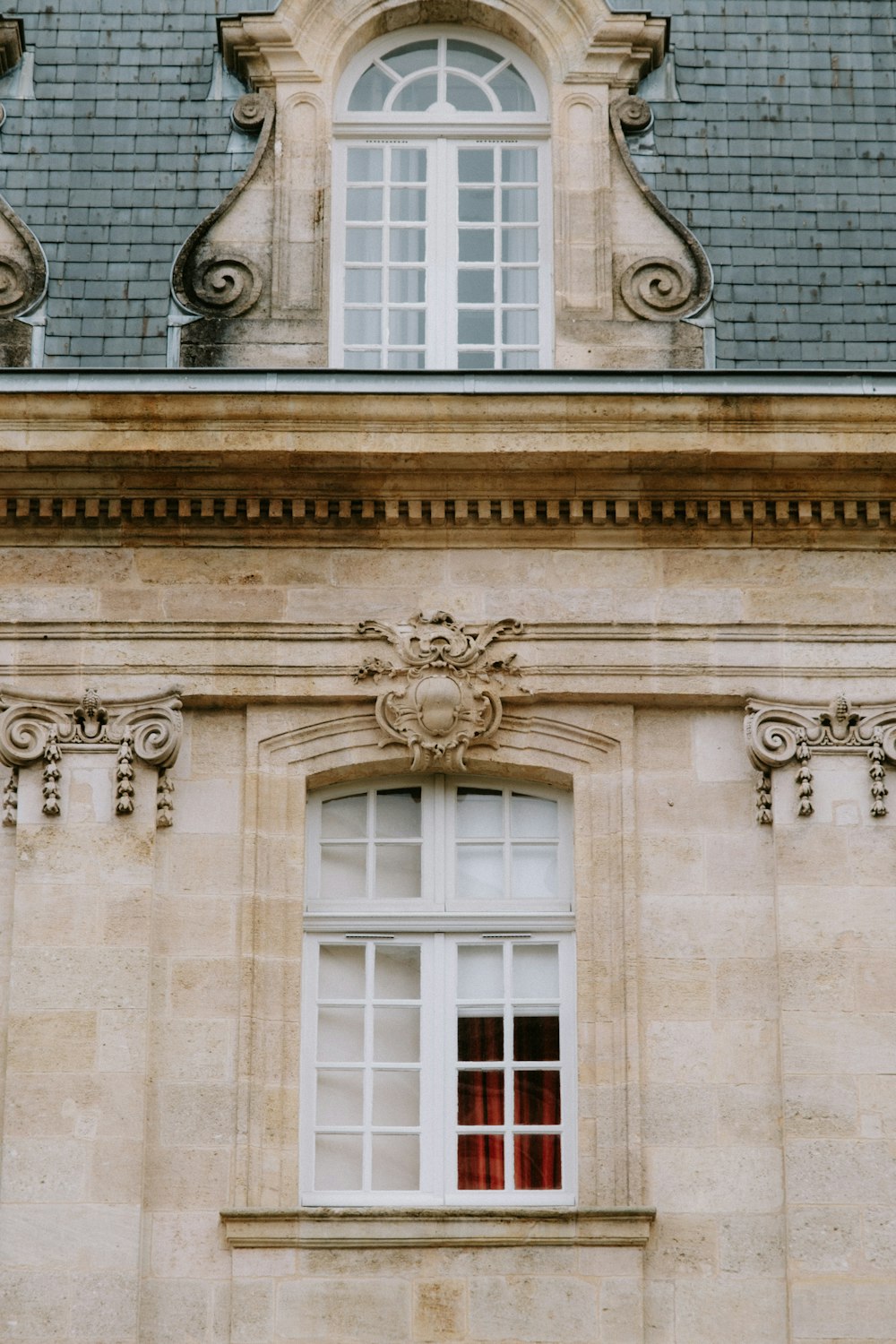 a large building with a clock on the front of it