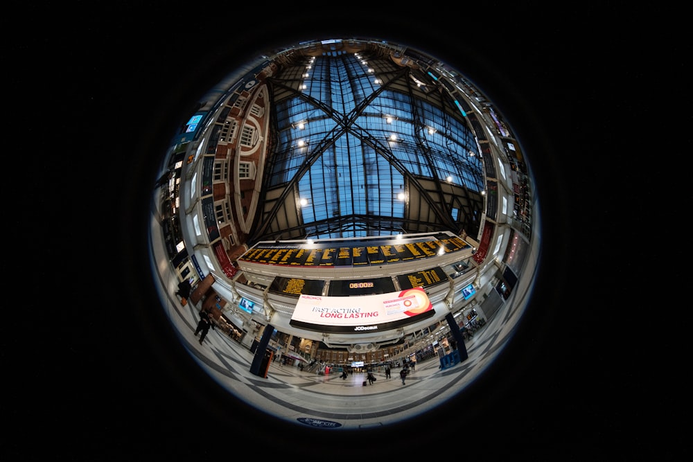 a fish eye view of a train station