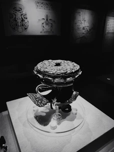 Close-up of a mysterious ancient artifact glowing with dark energy.