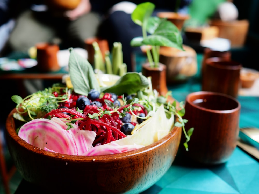 a close up of a bowl of food on a table