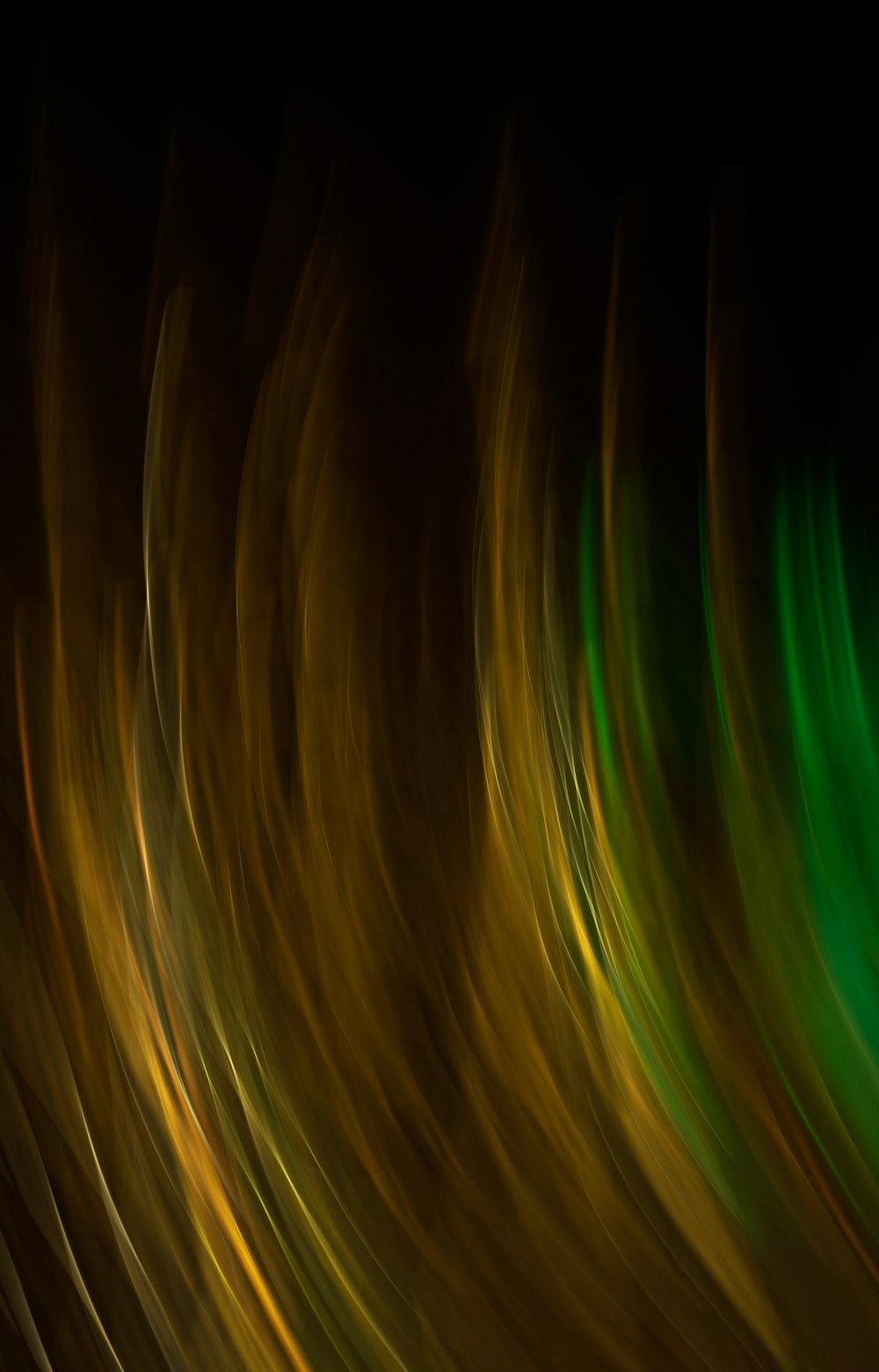 a blurry photo of a green and yellow swirl
