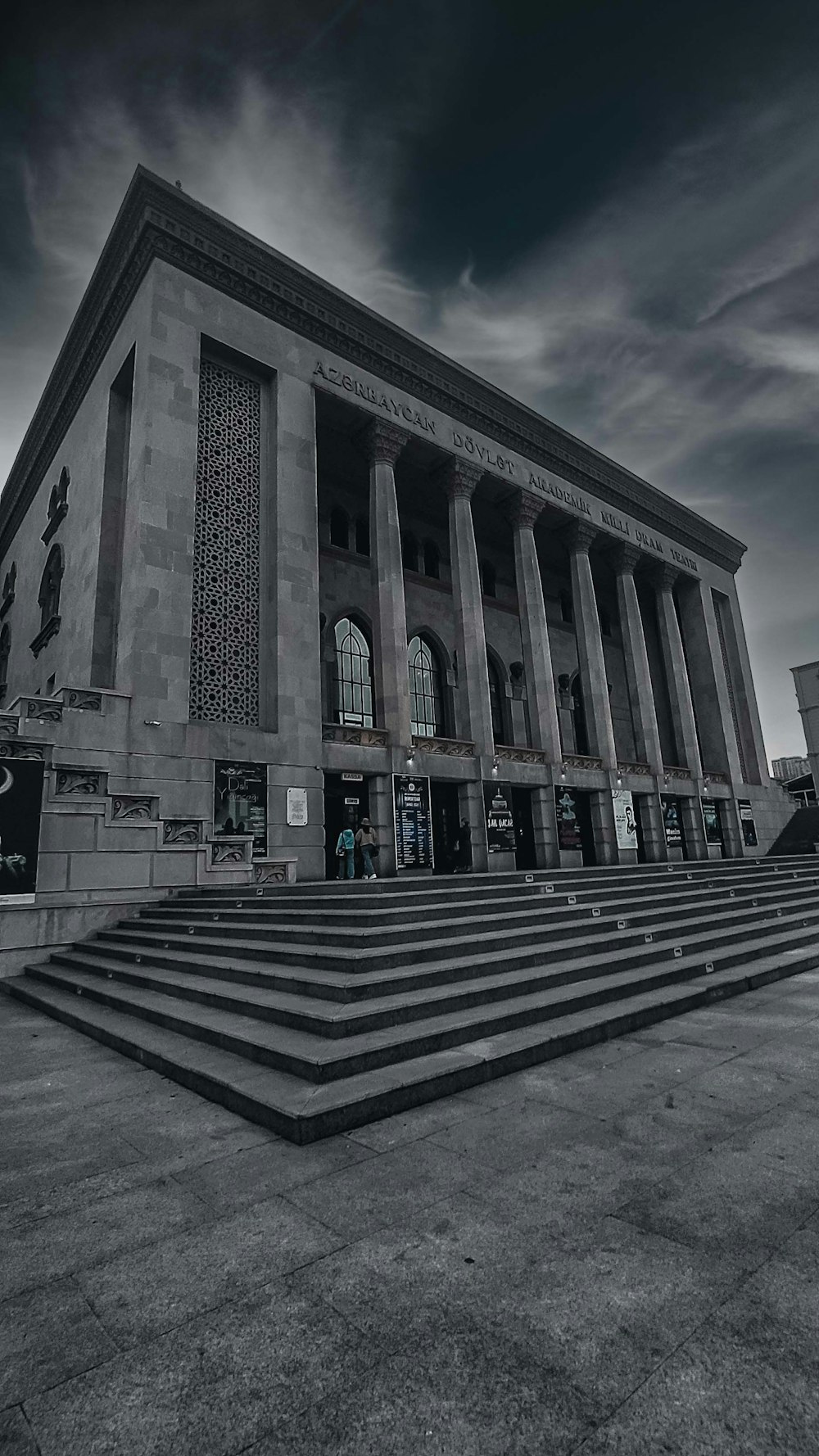 a black and white photo of a large building