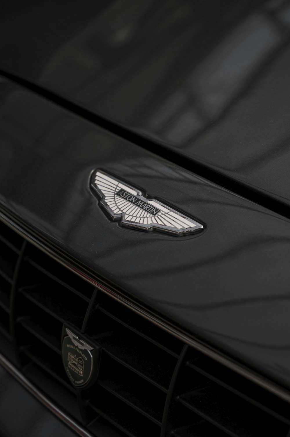 a close up of the front of a black car