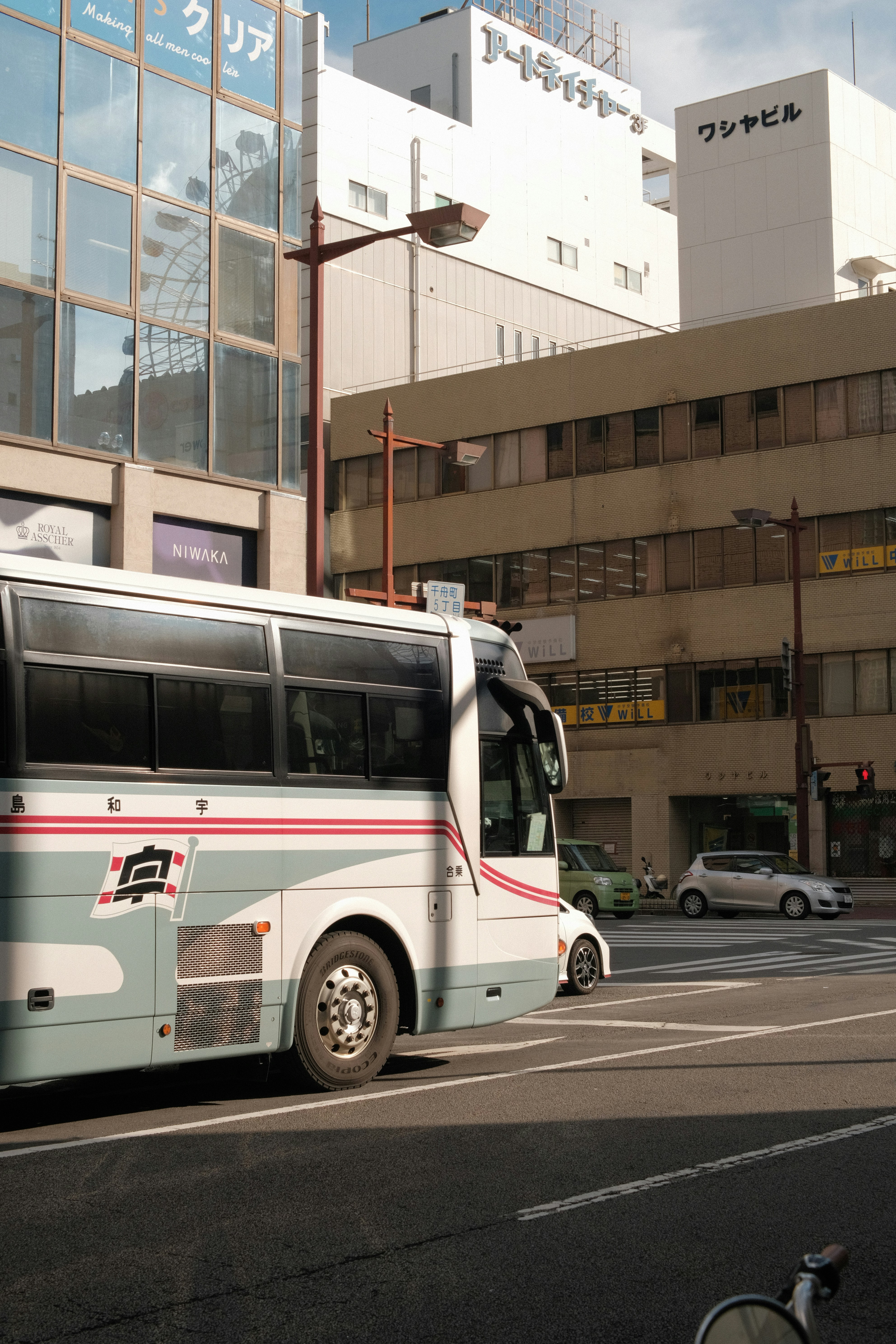 a bus is parked on the side of the road