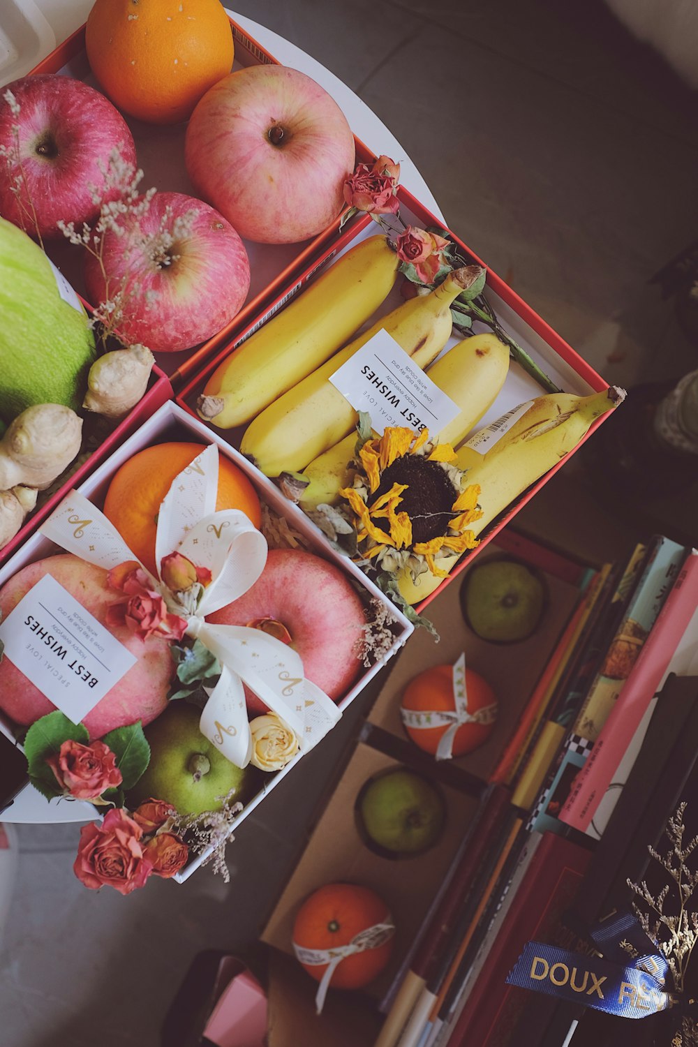 a table topped with boxes filled with different types of fruit